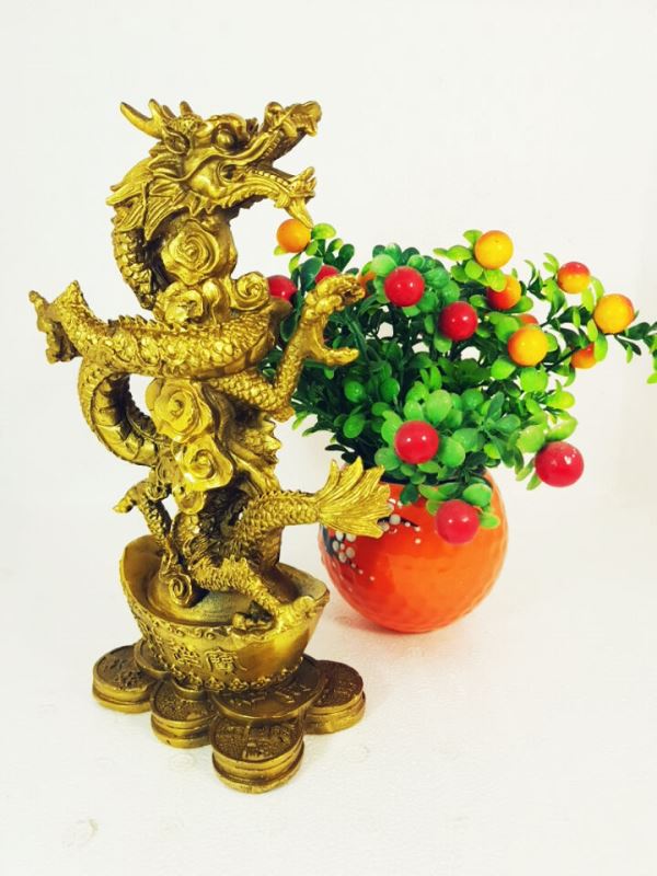 Tượng rồng thỏi vàng bằng đồng